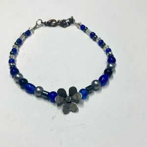 Handmade beaded bracelet in blue, silver and hematite. Original design